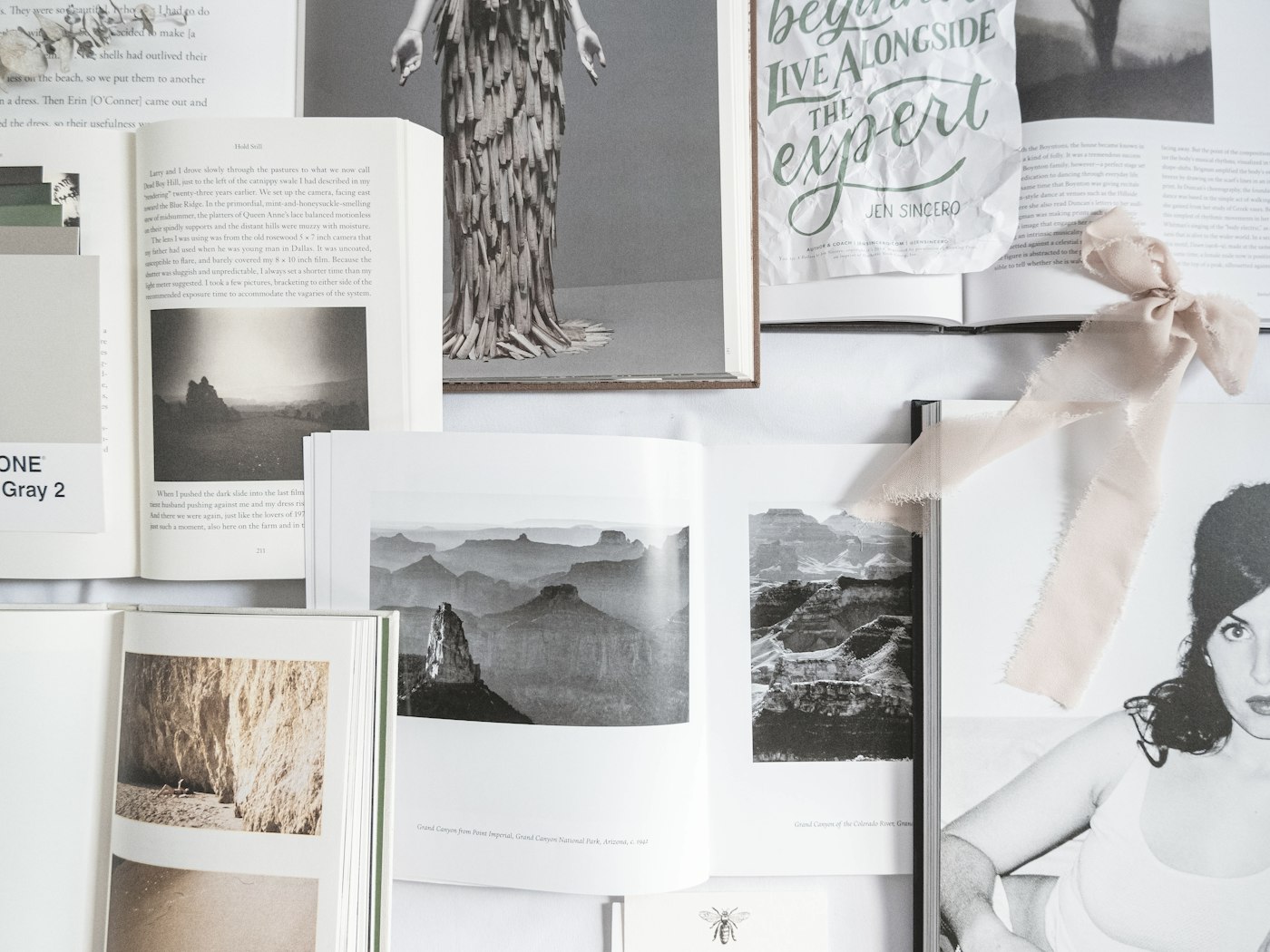 Design sketches and moodboards pinned above a desk